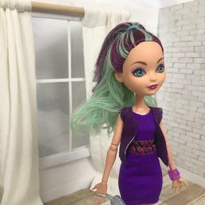 Madeline Hatter doll wearing purple dress